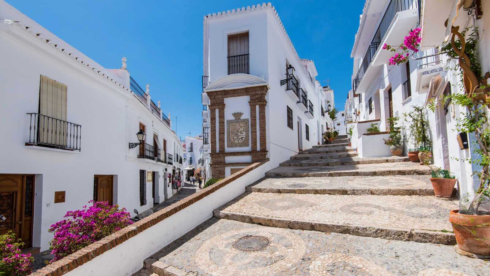 Cobblestone streets of Frigiliana in the province of Málaga. | Dreamstime